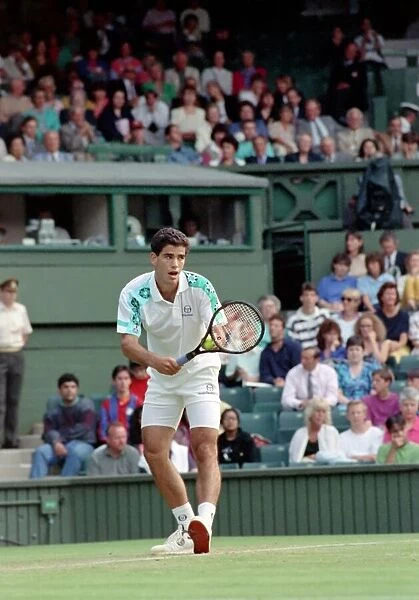 All England Lawn Tennis Championships at Wimbledon. Pete Sampras in action during