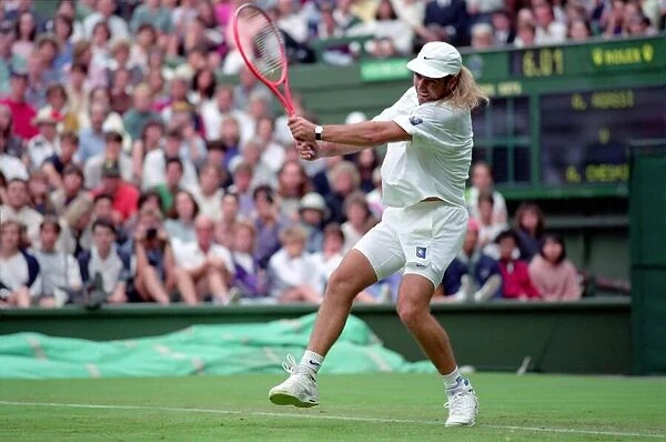 All England Lawn Tennis Championships at Wimbledon. Andre Agassi in action during