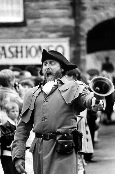 Alnwick Town Crier John Stevenson heads the procession through the town 26 June 1983