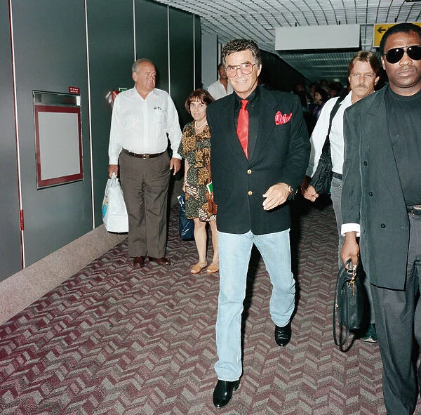 American actor Burt Reynolds at Heathrow Airport, arriving from New York