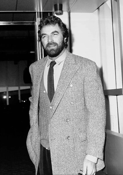 American movie star Tom Selleck leaves London airport for Los Angeles December 1990
