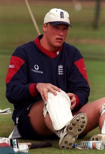 Andrew Flintoff puts his pads on at net practice July 1998 for England as he