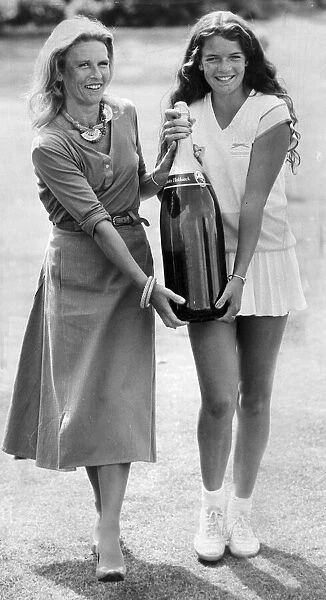 Annabel Croft and her mother Susan carrying a Salmanazar of champagne (same as 12 bottles