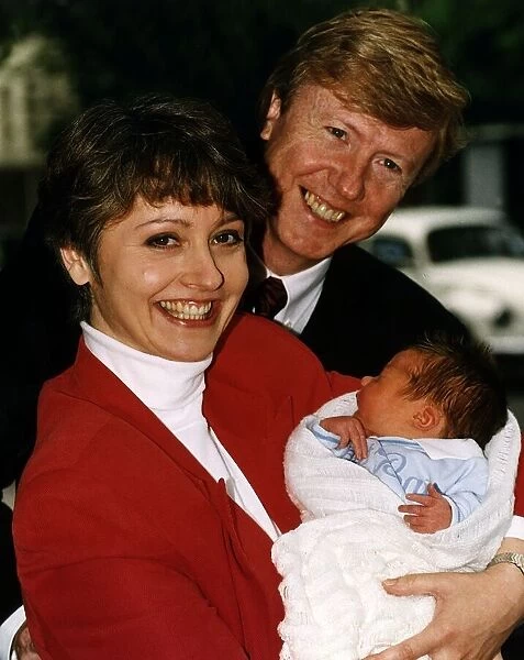 Anne Diamond TV Presenter with husband Mike Holdsworth and their new baby