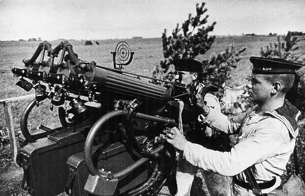 Anti aircraft gunners of the Russian Navy are seen on watch with their four barrel