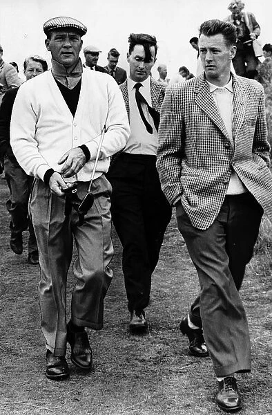 Arnold Palmer walking alongside fans at the British Golf Open 1962