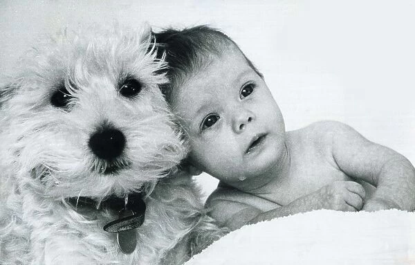 Baby Lucinda with her three year old West Highland terrier Haggis January 1976