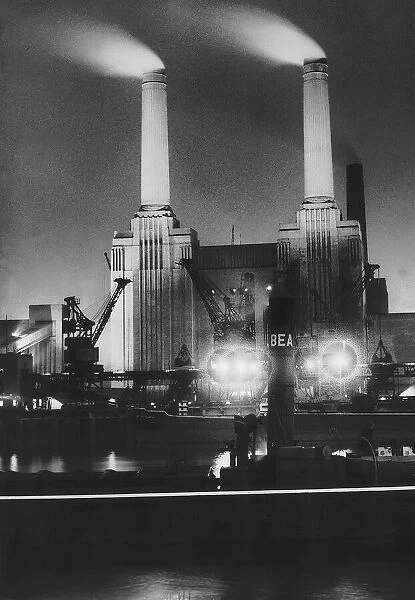 Battersea Power Station at night July 1950, Coal ships unload at Battersea Power Station