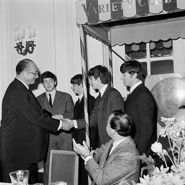 The Beatles attend the Variety Club Lunch. Left to right: Paul McCartney