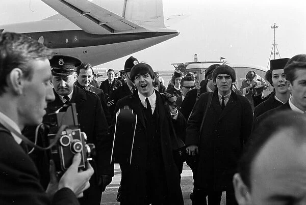 The Beatles February 1964 The Beatles arrive back in London from Paris