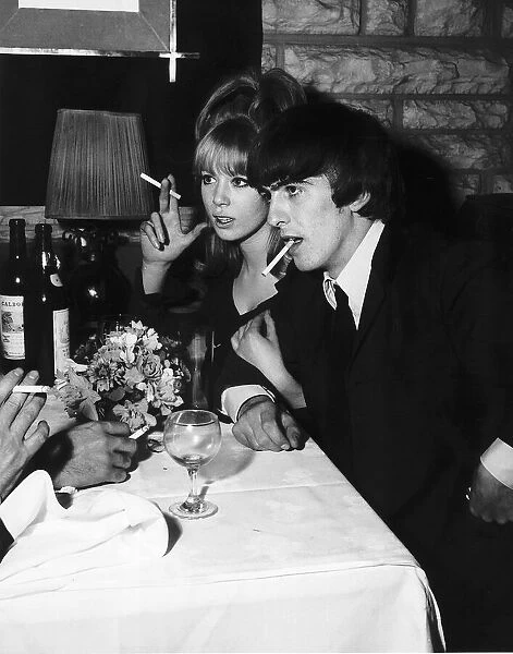 Beatles guitarist George Harrison with his model girlfriend model Patti Boyd circa 1965