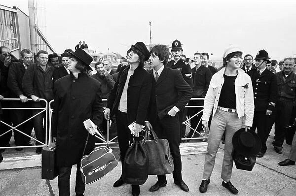 The Beatles at London Heathrow Airport. The Beatles returned home after a