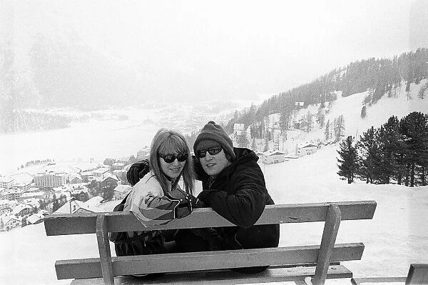 Beatles singer John Lennon with his wife Cynthia on a skiing holiday in St Moritz