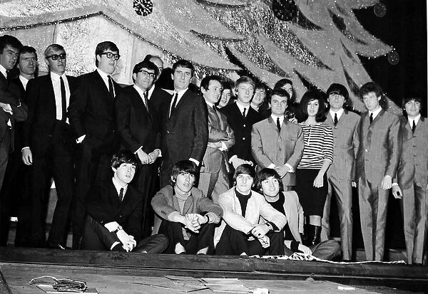 The Beatles and support acts onstage at the Hammersmith Odeon during rehearsals for