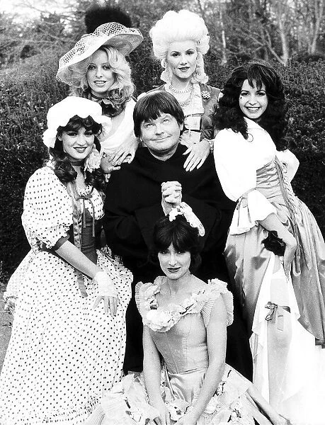 Benny Hill as a monk with girls during recording 1979 of his new show