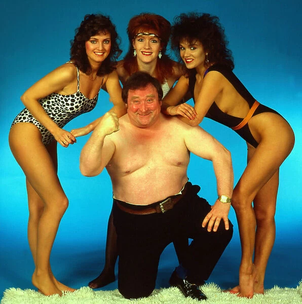 Bernard Manning with models March 1985