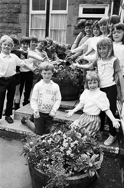 Blossoming out... these budding young gardeners from Denby CofE First School are boosting