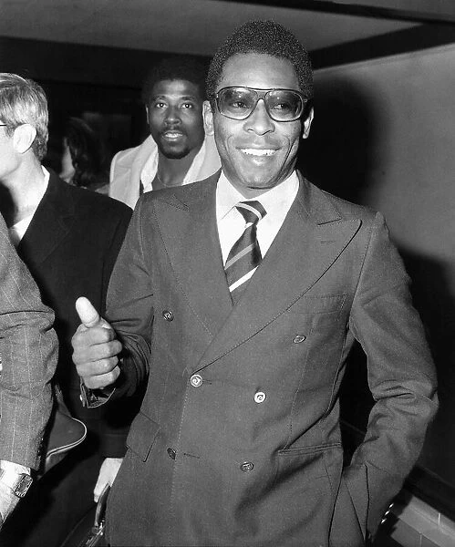 Brazillian footballer Pele at Heathrow Airport on route to Seychelles from NewYork