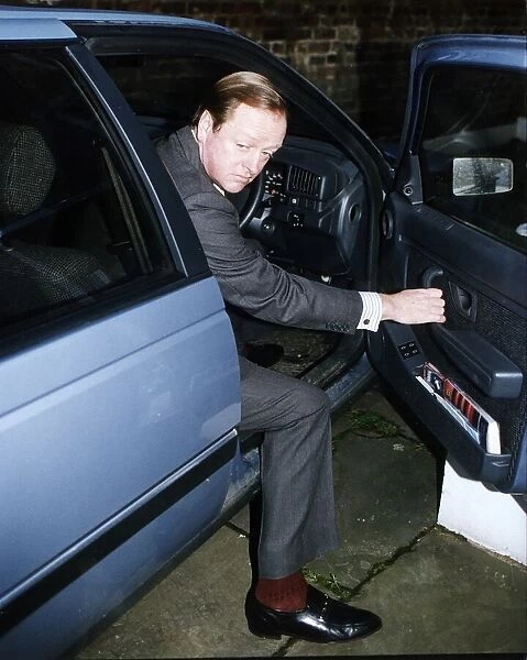 Brigadier Andrew Parker Bowles is seen getting out of his car