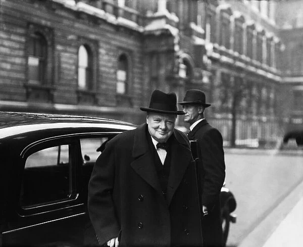 British Prime Minister Winston Churchill on his way to the House of Commons during