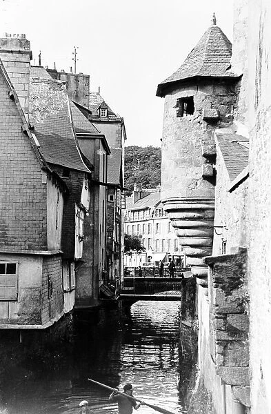 Brittany France. A scene in old Brittany, The ramparts and old house of Quimper