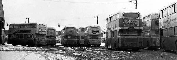 Buses stand immobilised by the winter weather at the Slatyford depot, Newcastle