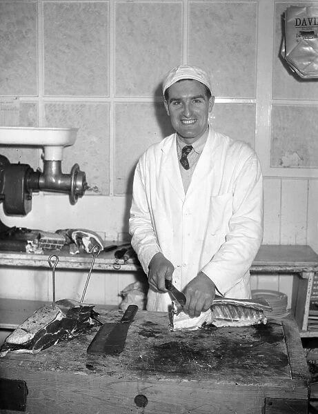 A Butcher at work at Davids Smith Butchery, Coventry Circa 1951