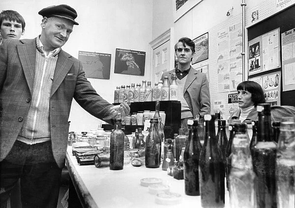 A buyer examines bottles at the Geordie Bottle Rally in Jarrow Hall