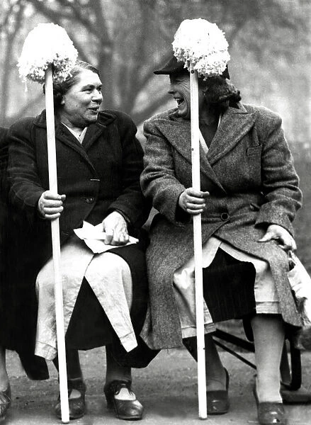 Char-Women holding their mops. February 1949