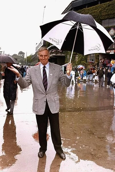 Charlton Heston American Actor at Wimbledon Holding umbrella