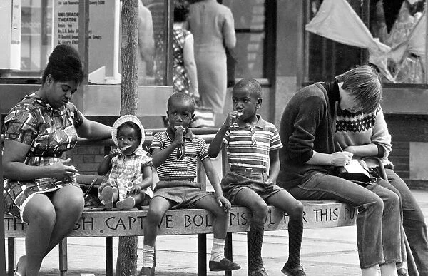 Children eating ice creams in Coventrys Precinct shopping centre