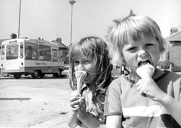 These children are enjoying an ice cream on a sunny day in June 1975
