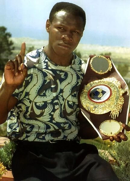 Chris Eubank Boxing holding his WBO Super Middle Weight Belt after defeating American