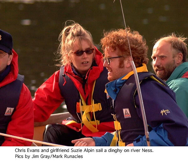 Chris Evans Radio One DJ and TV Presenter with girlfriend Suzie Alpin sailing a dingy