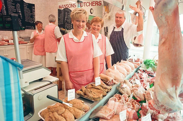 Chris Manson, his wife Jackie and their daughter Nicky, in their family butchers shop