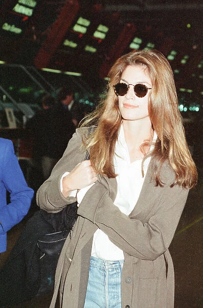 Cindy Crawford, American Model, at London Heathrow Airport, returning to the US