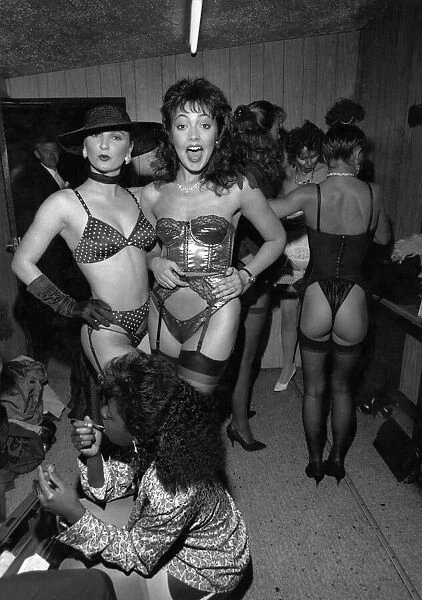 Clubs night clubs. Women in underwear. Basque, hat, bra, thong, suspenders