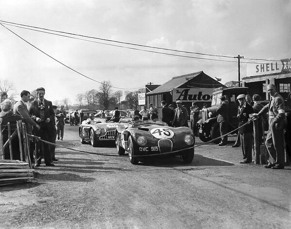 Competitors in the pit area of Oulton Park race track. Motor racing. April 1954 P009548
