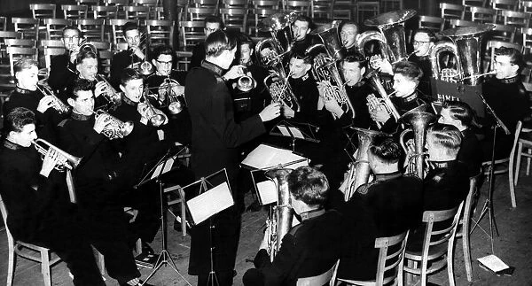 Conductor Alan Morgan, aged 23, leads a few members of the North Divisional Youth Brass