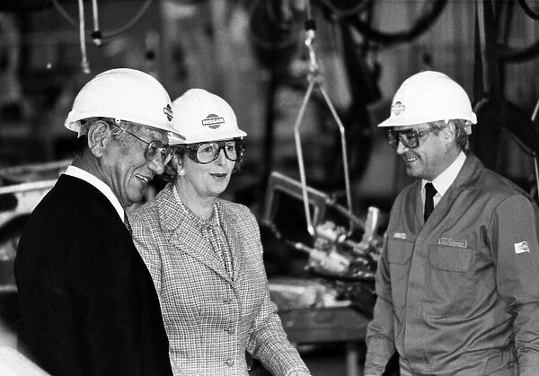 Conservative Prime Minister Margaret Thatcher, wearing a hard hat and protective glasses