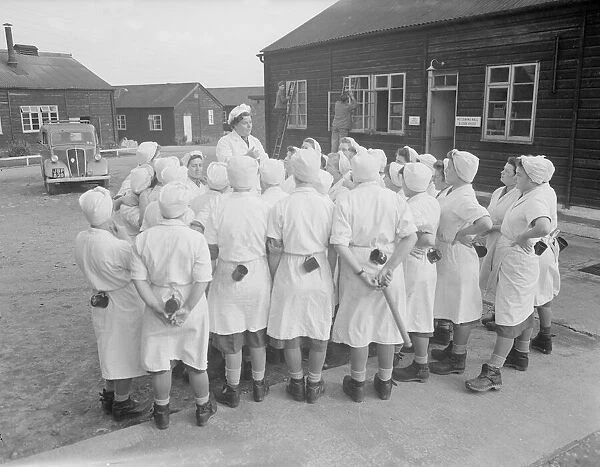 Cooks from the Womens Royal Army Corps (WRAC) seen here on parade. 26th October 1952