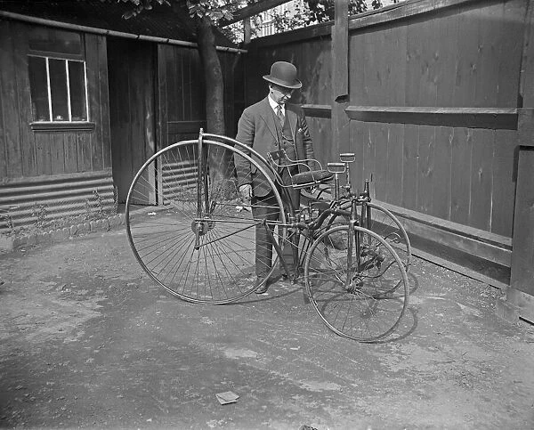Coventry cycle collector Mr T M Freeman seen here admiring his new purchase a Singer