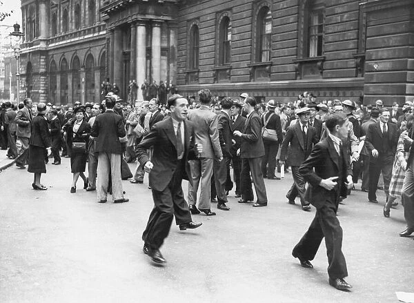 Crowds leaving Downing Street after an air raid warning