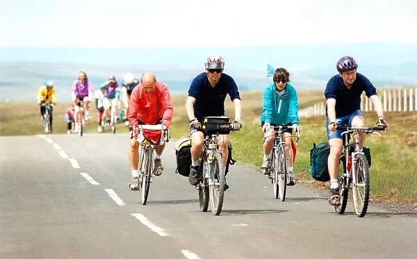 Cyclists on the C2C near Allenheads in Northumberland