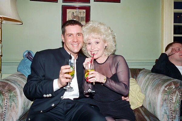 Dale Winton and Barbara Windsor share a nice moment at Dales birthday party