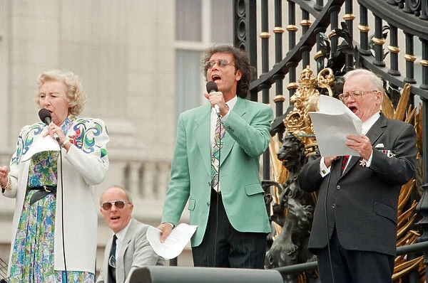 Dame Vera Lynn, Cliff Richard and Harry Secombe, singing for the crowds gathered at