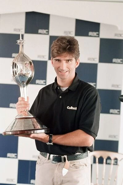Damon Hill of Arrows-Yamaha, is presented with the Hawthorn Memorial Trophy