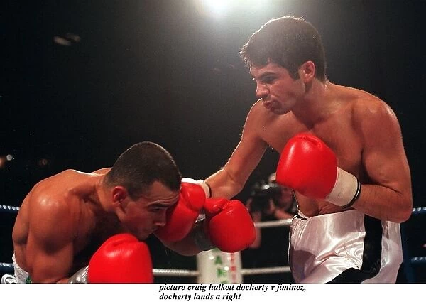 Daniel Jiminez of Puerto Rico and Drew Docherty of Scotland in action during their WBO