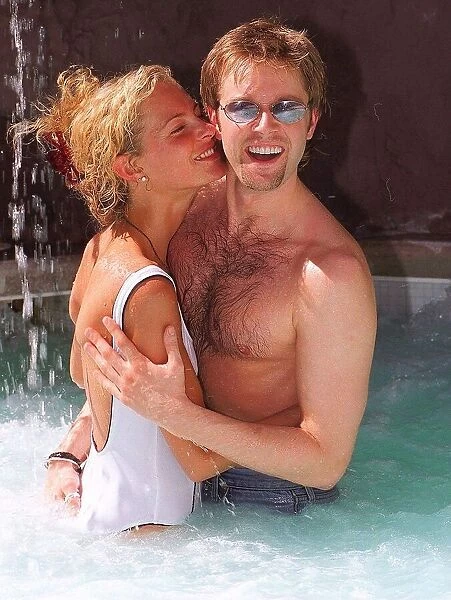 Darren Day and Tracey Shaw frolic in the pool in Las Vegas