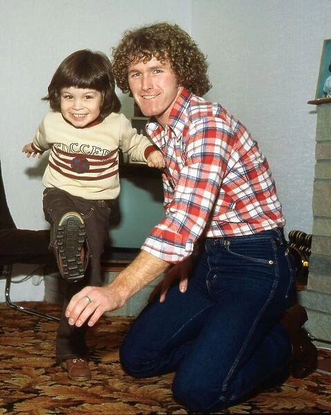 Davie Provan at home with his daughter January 1980